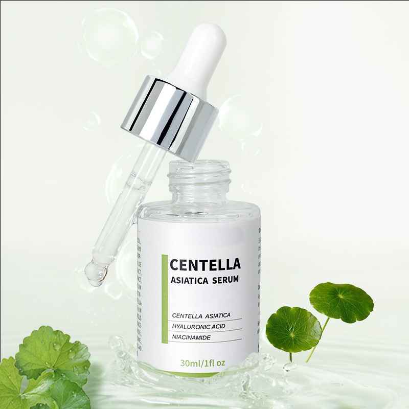 Centella Repair Serum with packaging on green silk